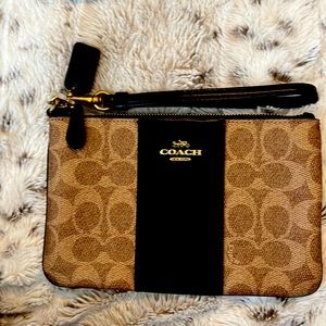 Signature coated canvas and crossgrain leather